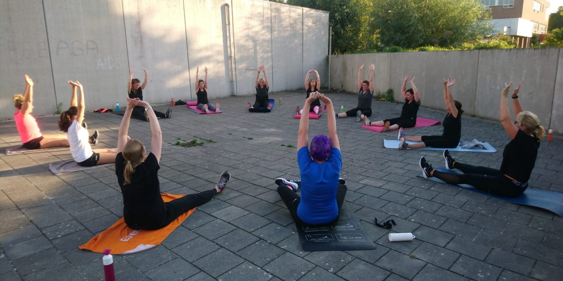 Pilatesles in de buitenlucht